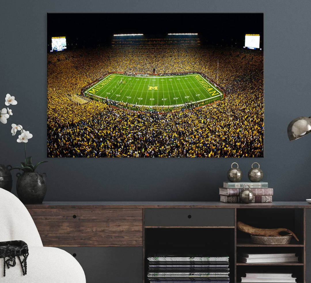 Aerial view of Michigan Stadium night game, ideal for Michigan Wolverines Football Team displayed on a triple canvas wall art.