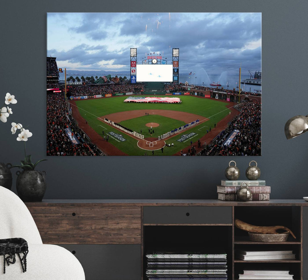 This framed 3-panel canvas MLB wall art features a giant flag and fans under a cloudy sky at Oracle Park.