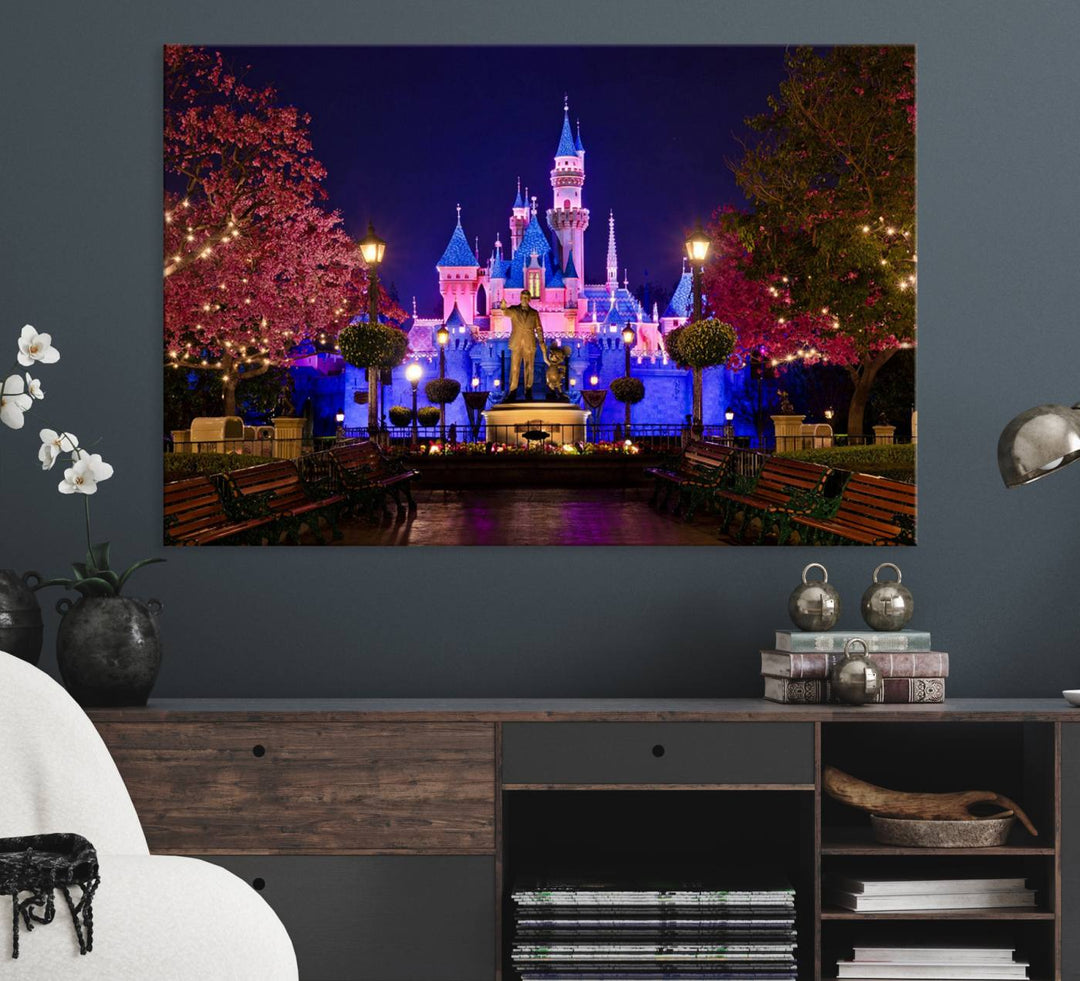 The Castle Large Wall Art is surrounded by illuminated trees at night.