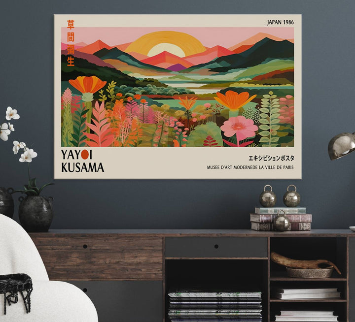 The Yayoi Kusama Landscape Canvas Print, featuring vibrant floral mountains and sunset scenery, enhances the room.