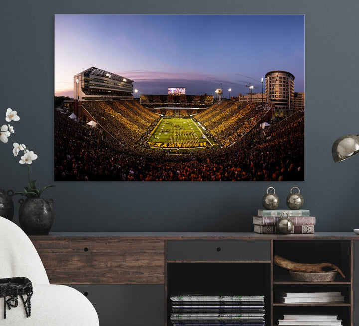 The Iowa Hawkeyes Kinnick Stadium Wall Art Canvas Print captures a sunset scene, making it perfect for display on a wall.