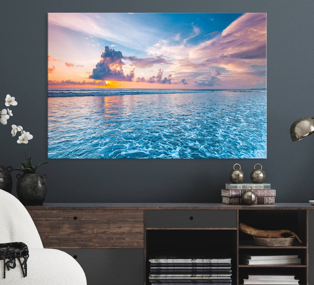 An Ocean Sunset Canvas Wall Art depicting a vibrant sky and rolling waves.