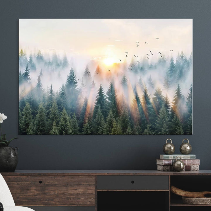 Misty Pine Forest Wall Art: A depiction of sunrise over foggy trees and birds against a bright sky; a framed woodland scene ideal for home or office decor.