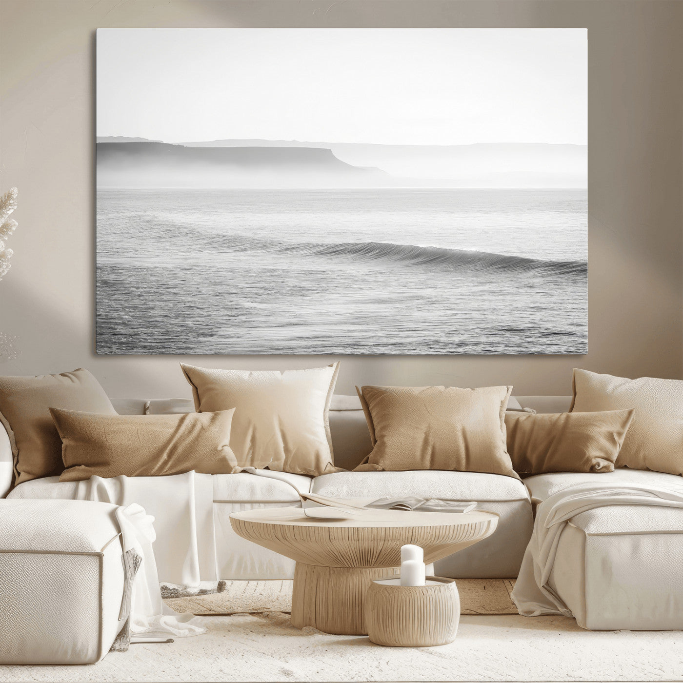 A black and white minimalist seascape featuring soft rolling waves and misty distant cliffs, creating a serene and timeless coastal atmosphere.