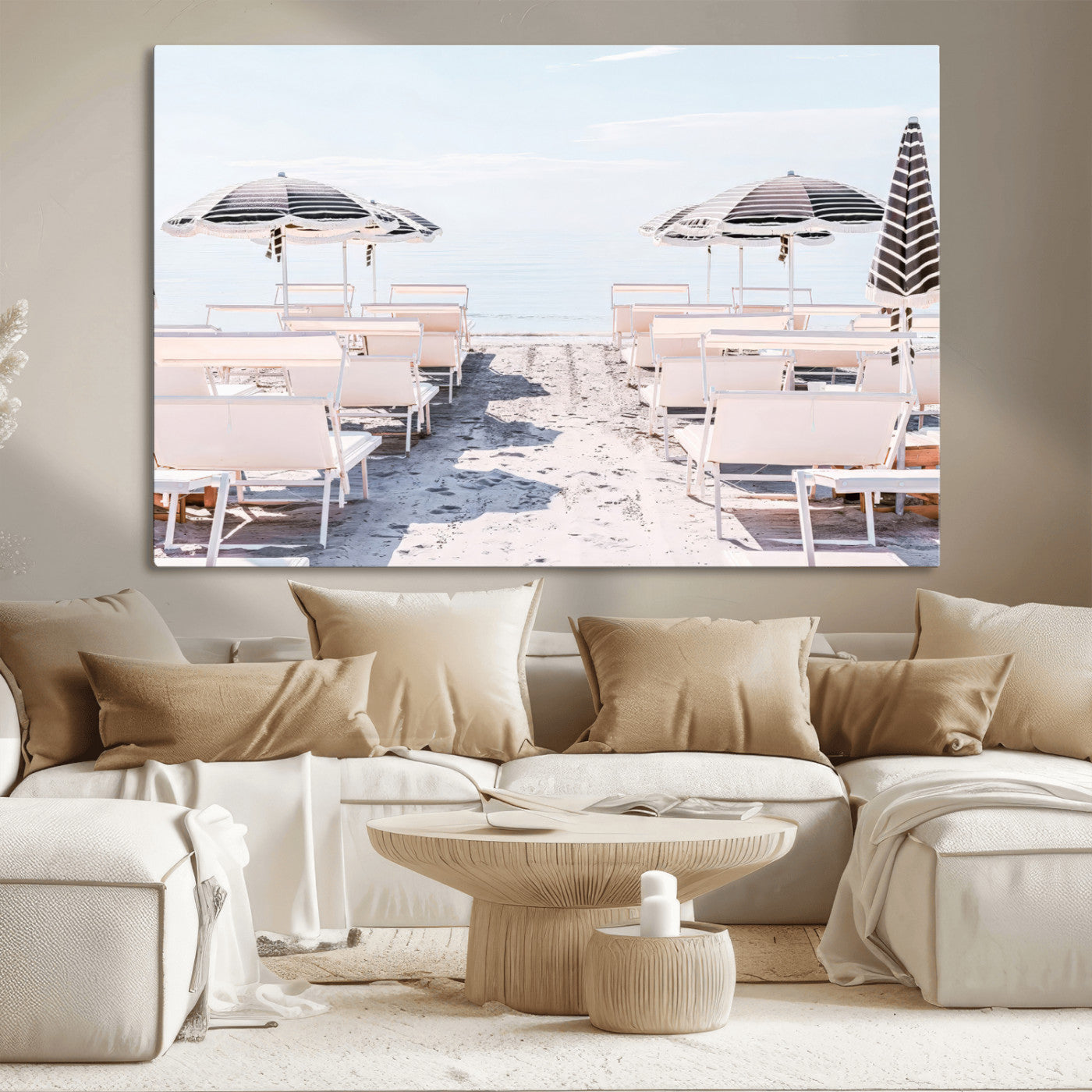 A serene minimalist beach scene featuring striped umbrellas, soft pastel sand, and an elegant lounge setup, creating a tranquil and stylish coastal retreat.