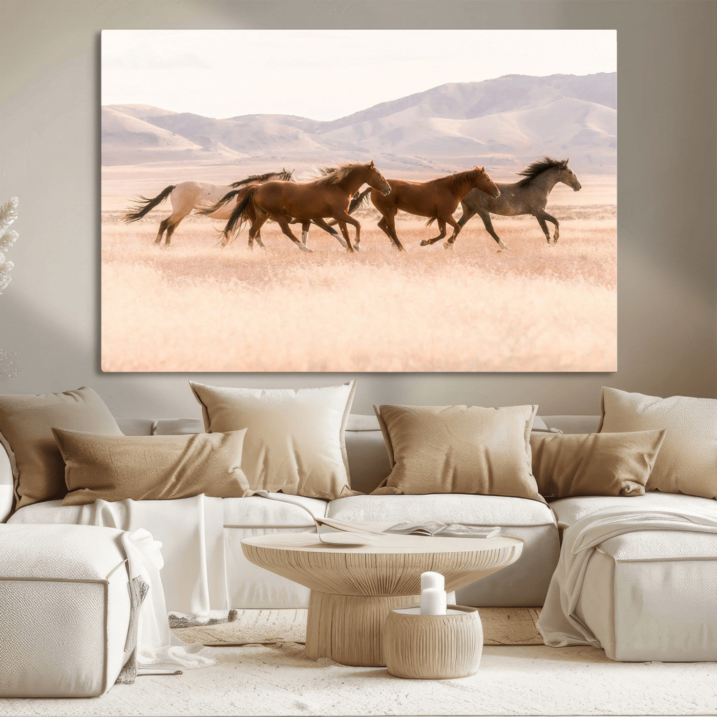 A herd of wild horses galloping through a sunlit desert plain with mountains in the background, perfect for rustic or western-themed wall decor.