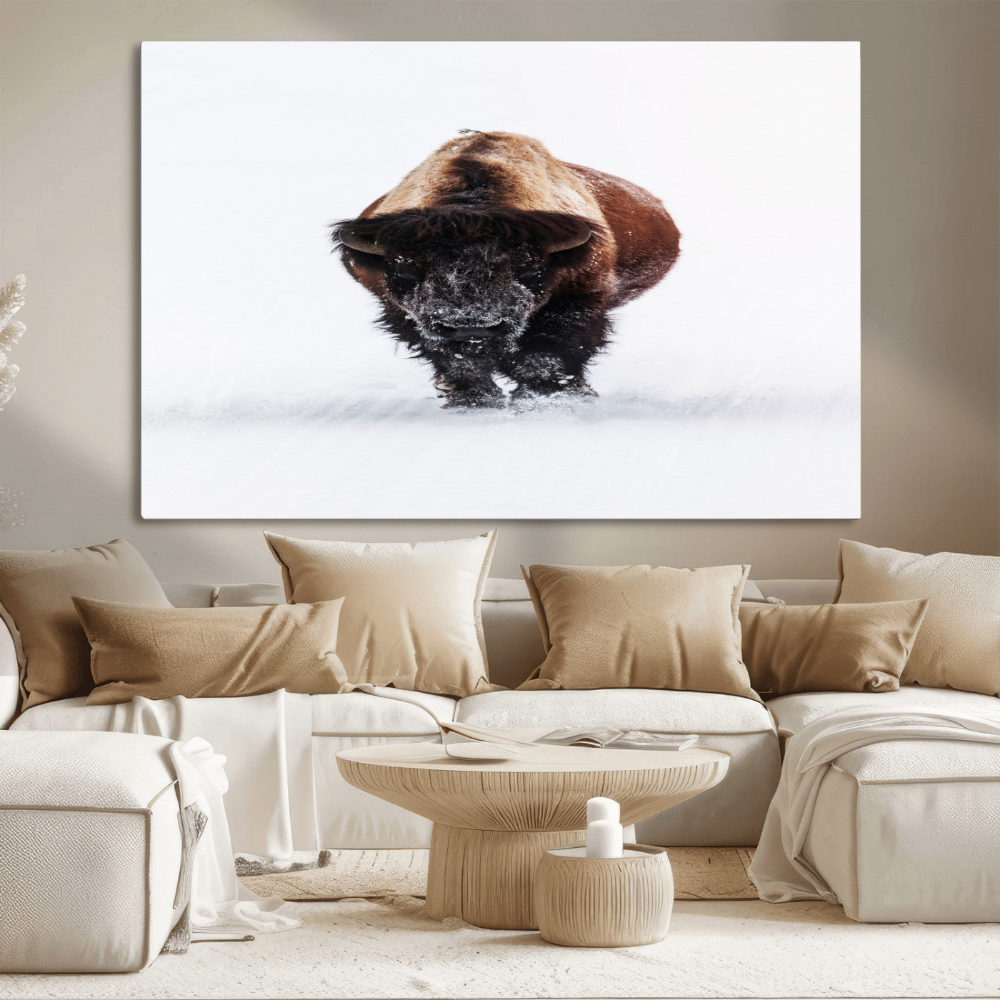Front view of a strong bison walking in deep snow, isolated white background, perfect for rustic or lodge-style home decor.