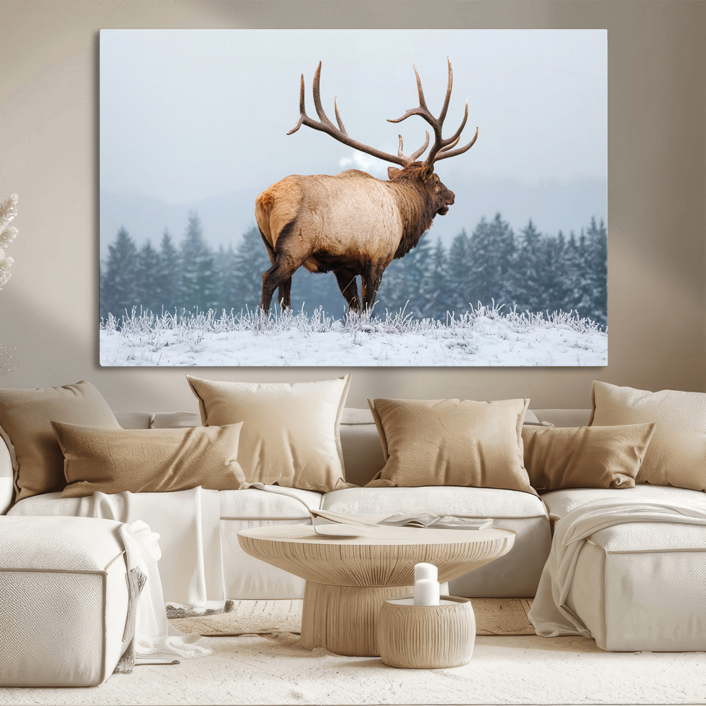Large elk standing in a snowy field with pine trees in the background, ideal for rustic cabin or lodge-style wall decor.