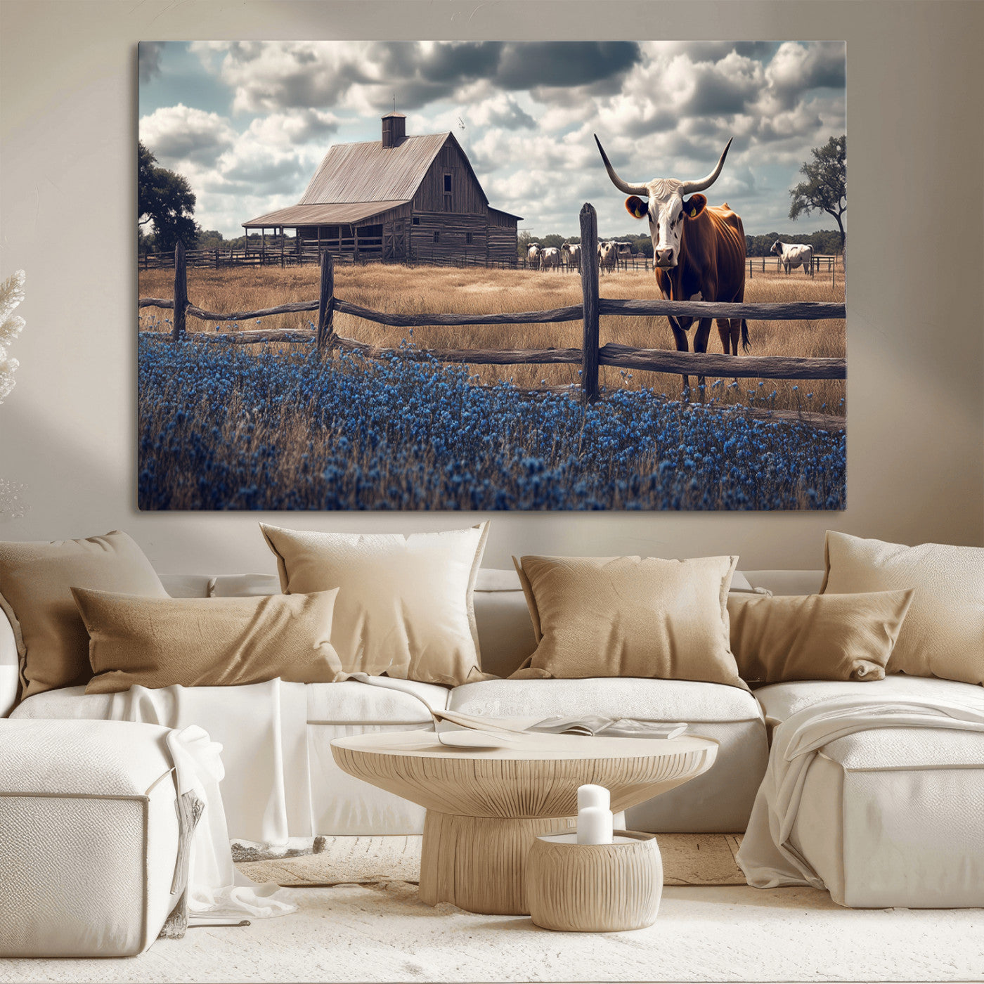 Framed canvas art of a Texas Longhorn cow near a rustic barn and bluebonnet field, ideal for country-style or farmhouse wall decor.