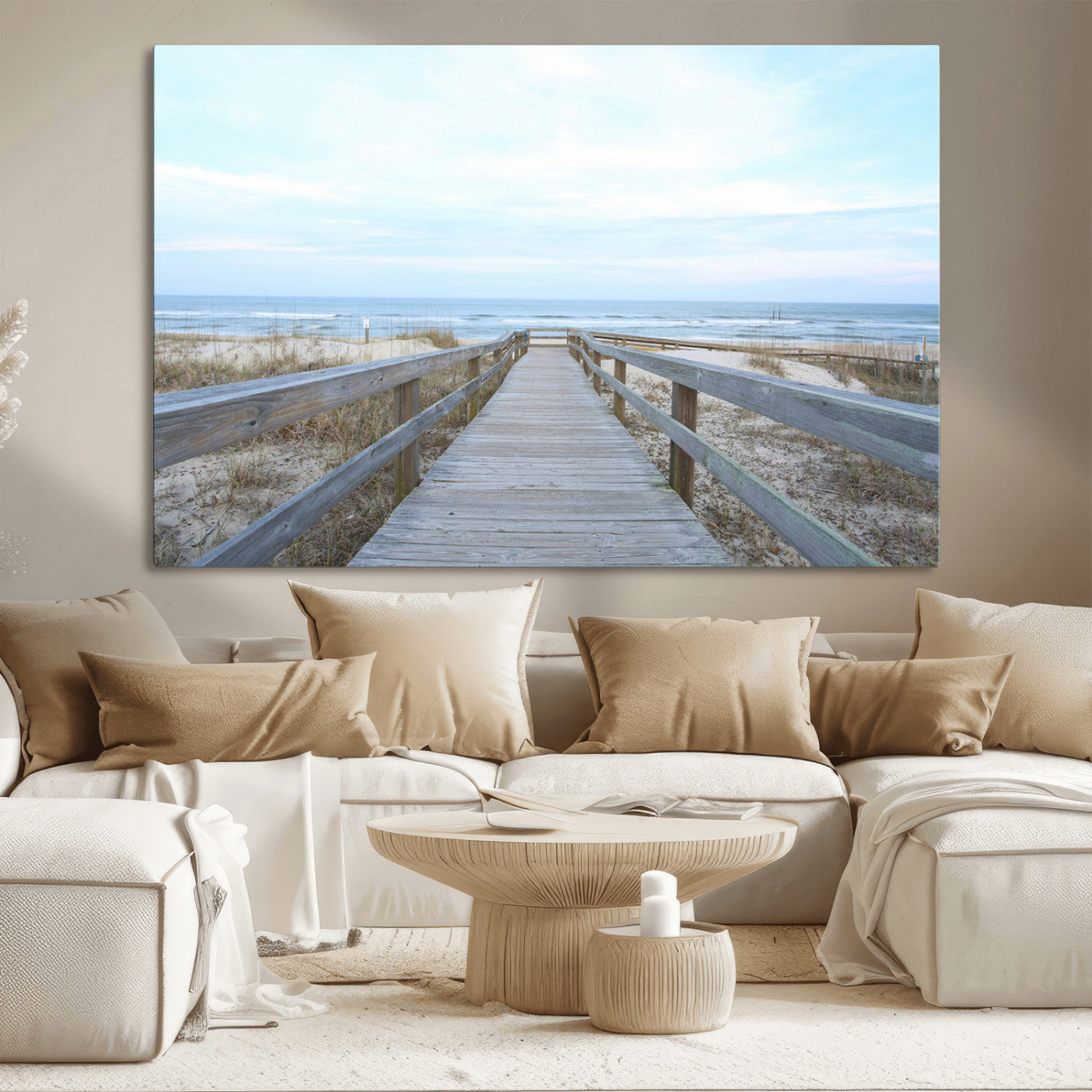 Wooden boardwalk leading to a peaceful beach with gentle ocean waves under a soft pastel sky, perfect for coastal and nautical home decor.