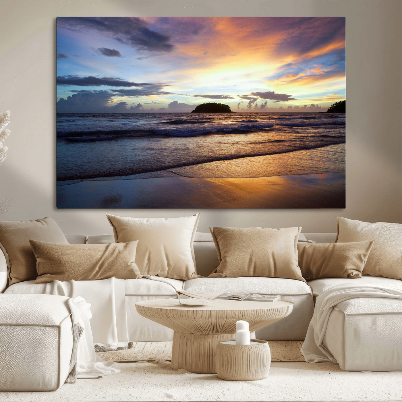 A tropical beach at sunset with waves gently washing ashore, reflecting golden and purple hues in the sky, creating a tranquil coastal scene.