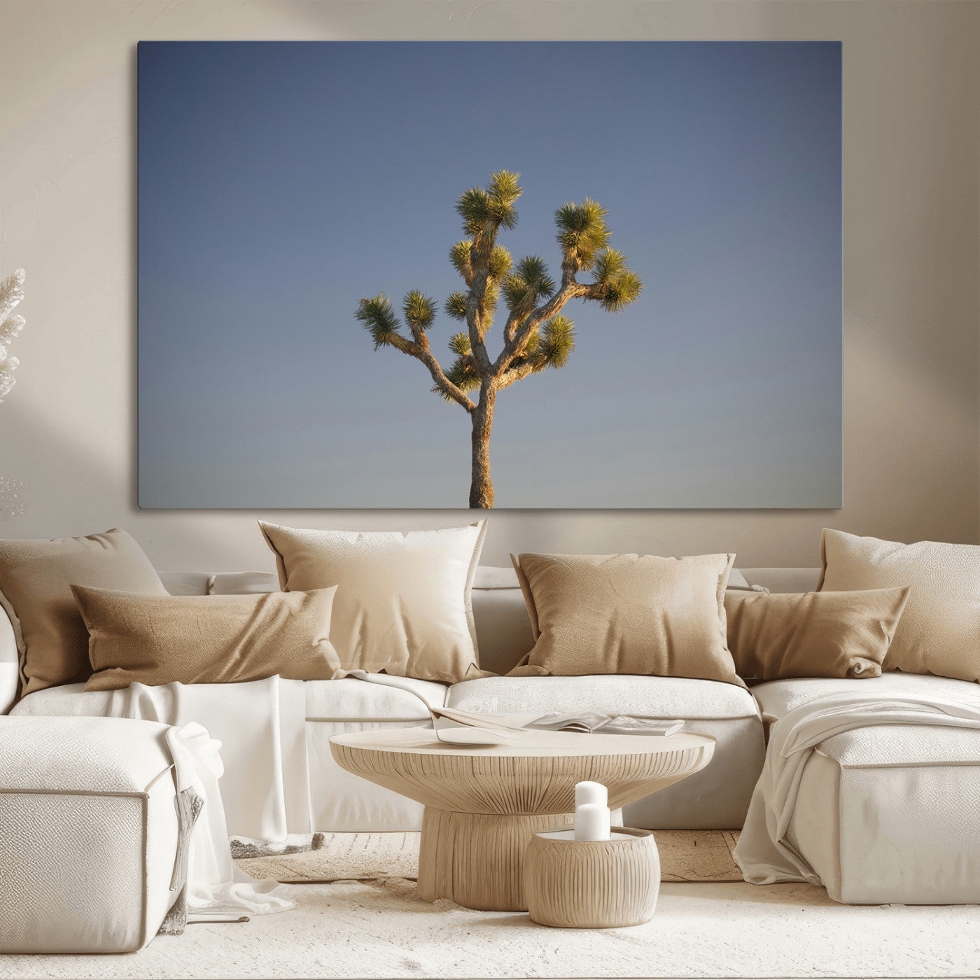 A lone Joshua Tree standing against a deep blue sky, capturing the serene and rugged beauty of the Southwestern desert landscape.