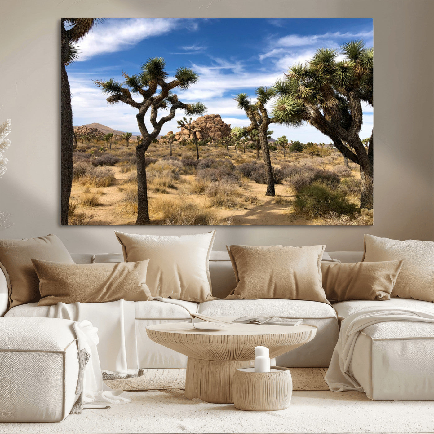 Scenic Joshua Tree landscape with rugged desert terrain, golden dry grass, and a deep blue sky, creating a warm, rustic Southwestern aesthetic.