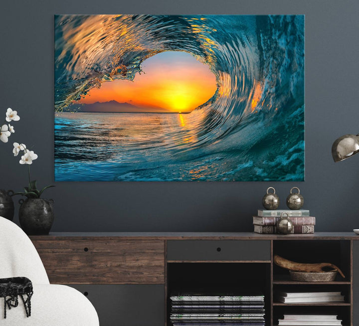 The Ocean Wave Sunset Wall Art canvas print features a vibrant ocean wave at sunset, forming a tunnel with silhouetted mountains.