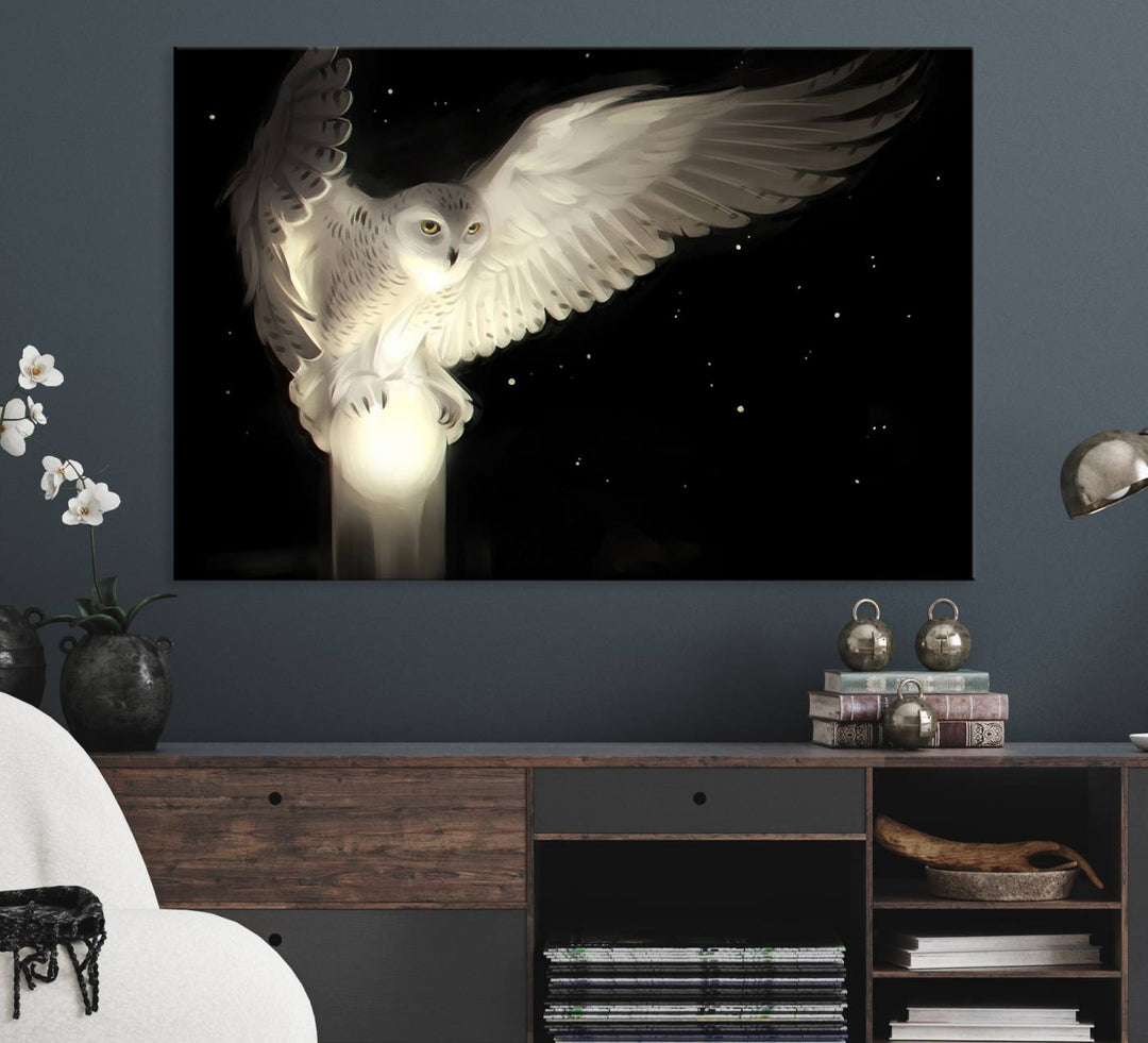 The Night Owl Art graces the wall with its depiction of a snowy owl on a glowing orb, perfect for modern decor.