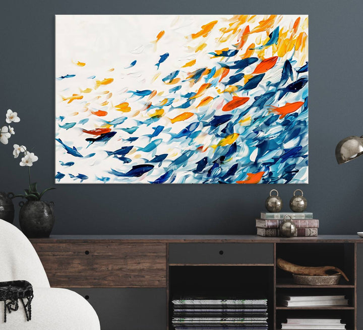 A colorful Abstract Fish Shoal Canvas Print hangs on the wall.