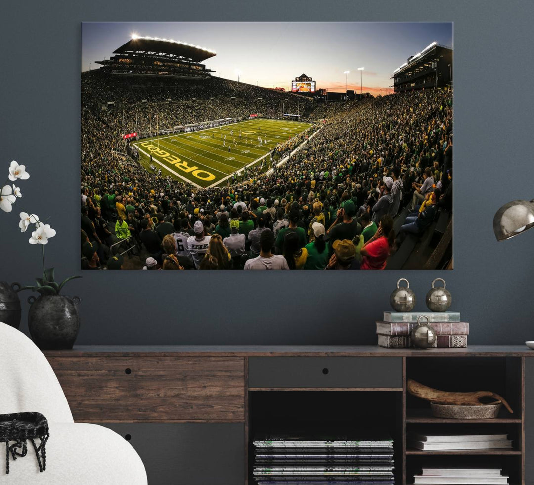 The Oregon Stadium Canvas Wall Art features a depiction of a packed Autzen Stadium with OREGON prominently displayed on the field.