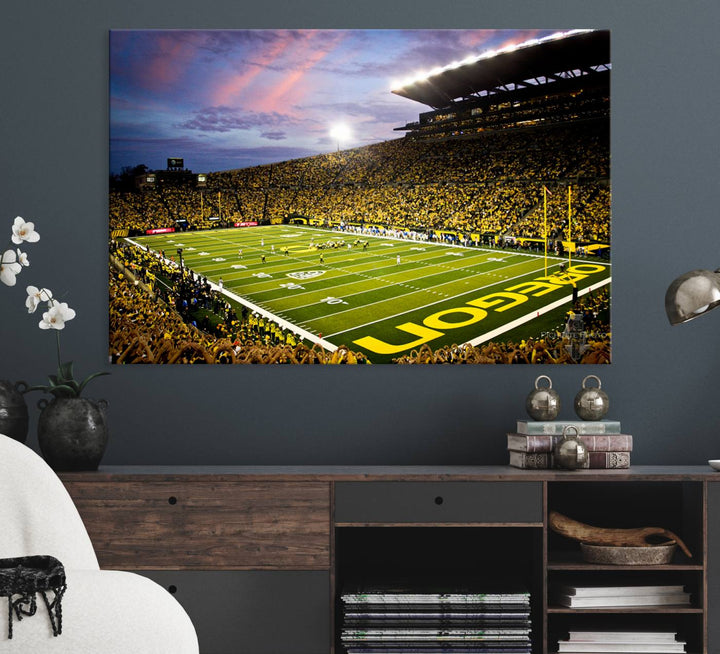 This gallery-quality canvas print features a depiction of the OREGON field filled with fans at sunset, capturing the essence of the University of Oregon Ducks Autzen Stadium.