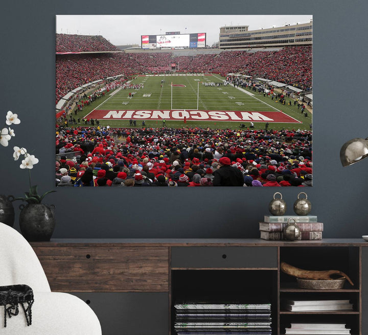 The wall art depicts WISCONSIN in red and white, similar to Wisconsin Badgers Football Canvas Art.