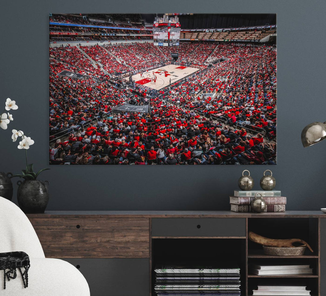 A painting of Louisville Cardinals fans in red at the KFC Yum Center Arena.