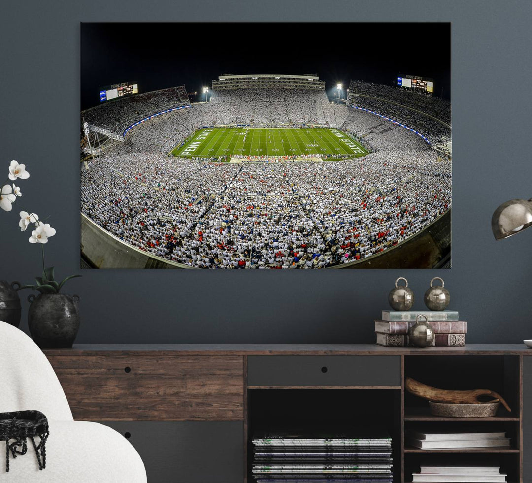 The triple canvas wall art depicts Beaver Stadiums vibrant atmosphere during a night game from the end zone.