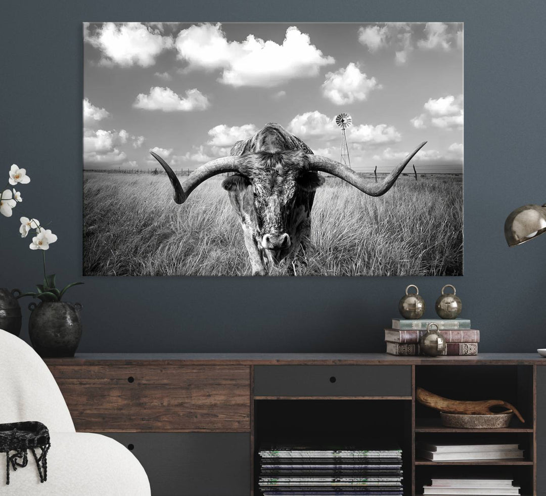 Longhorn Cow Field Canvas Print featuring rustic charm with a windmill backdrop.