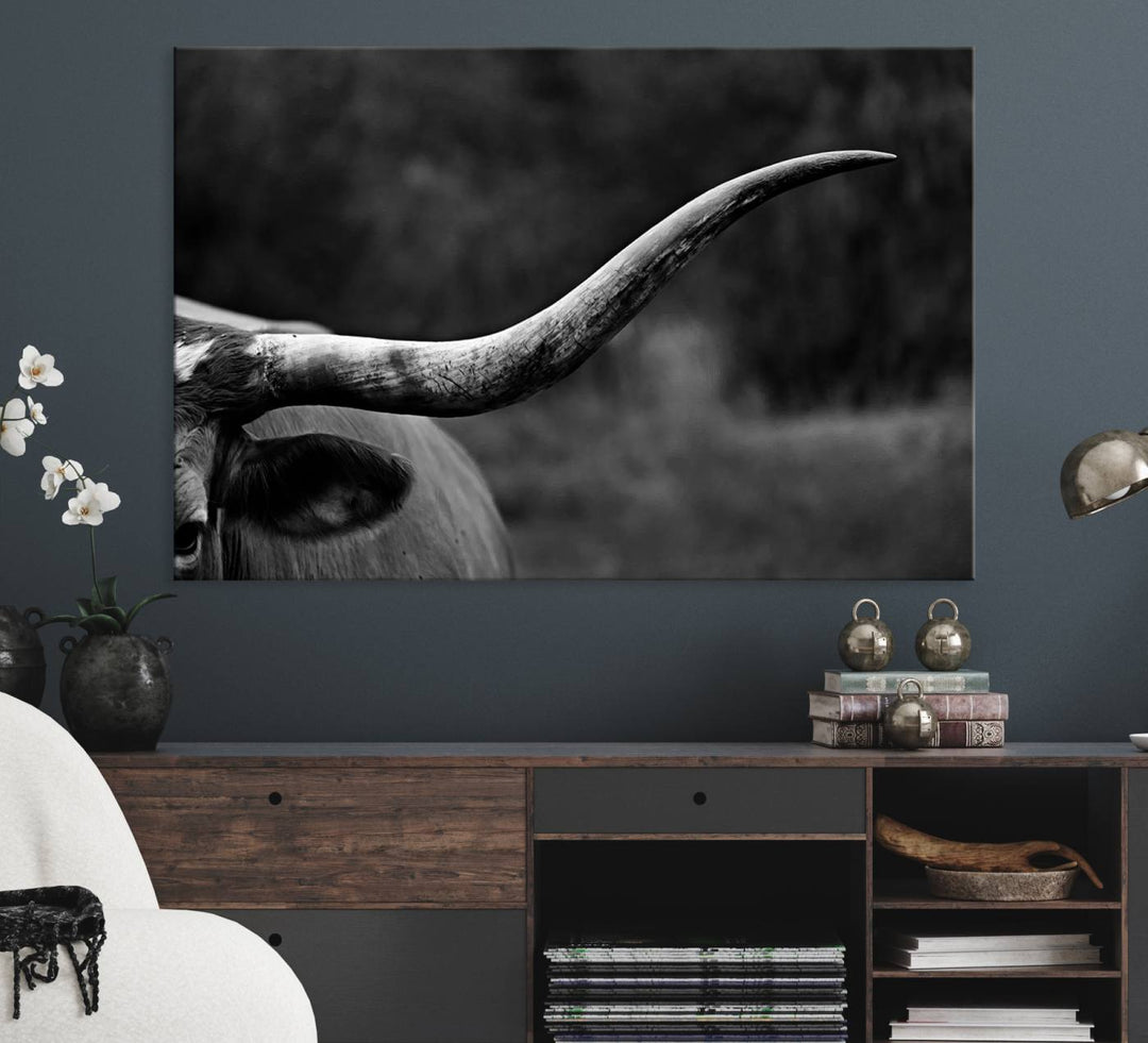 Cow Longhorn Wall Art: This black and white print adds rustic charm.