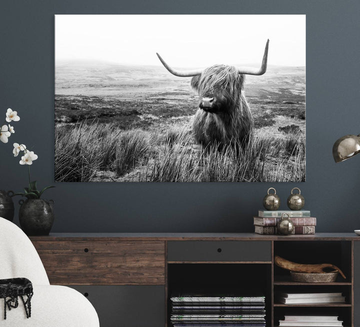 The Scottish Highland Cow black and white canvas print adds rustic farmhouse charm to any wall.