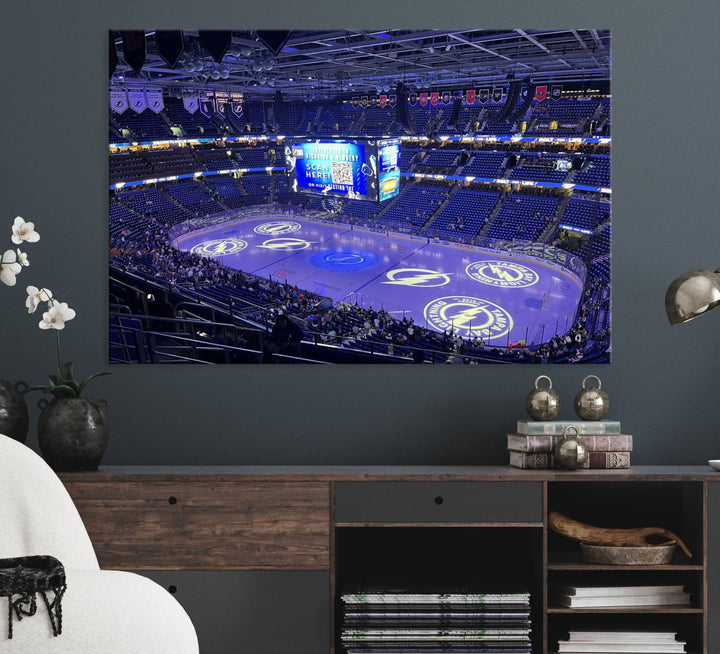 The wall art canvas print at Amalie Arena features team logos on ice, encapsulating the vibrant atmosphere of an NHL hockey stadium.