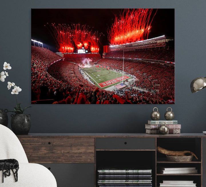 A vibrant red canvas art of a packed Ohio State Buckeyes stadium at night with fireworks.