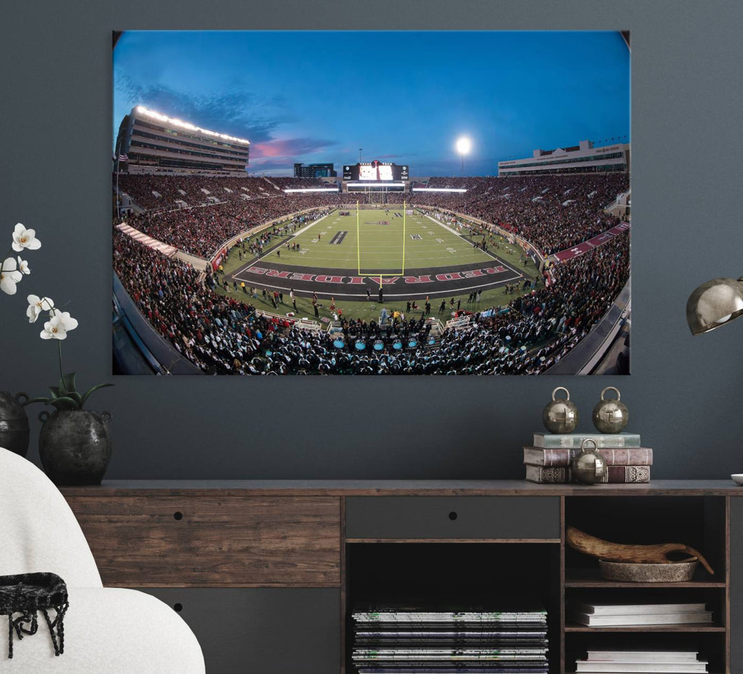 The wall art in the living room features a Texas Tech Red Raiders Football Team Print, showcasing Jones AT&T Stadium at dusk.