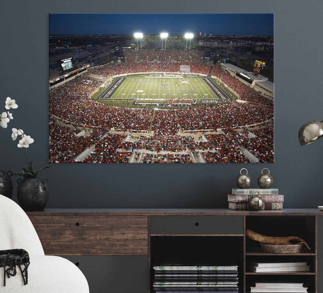 Canvas wall art featuring an aerial view of the Texas Tech Red Raiders packed night game at Lubbock’s Jones AT&T Stadium.