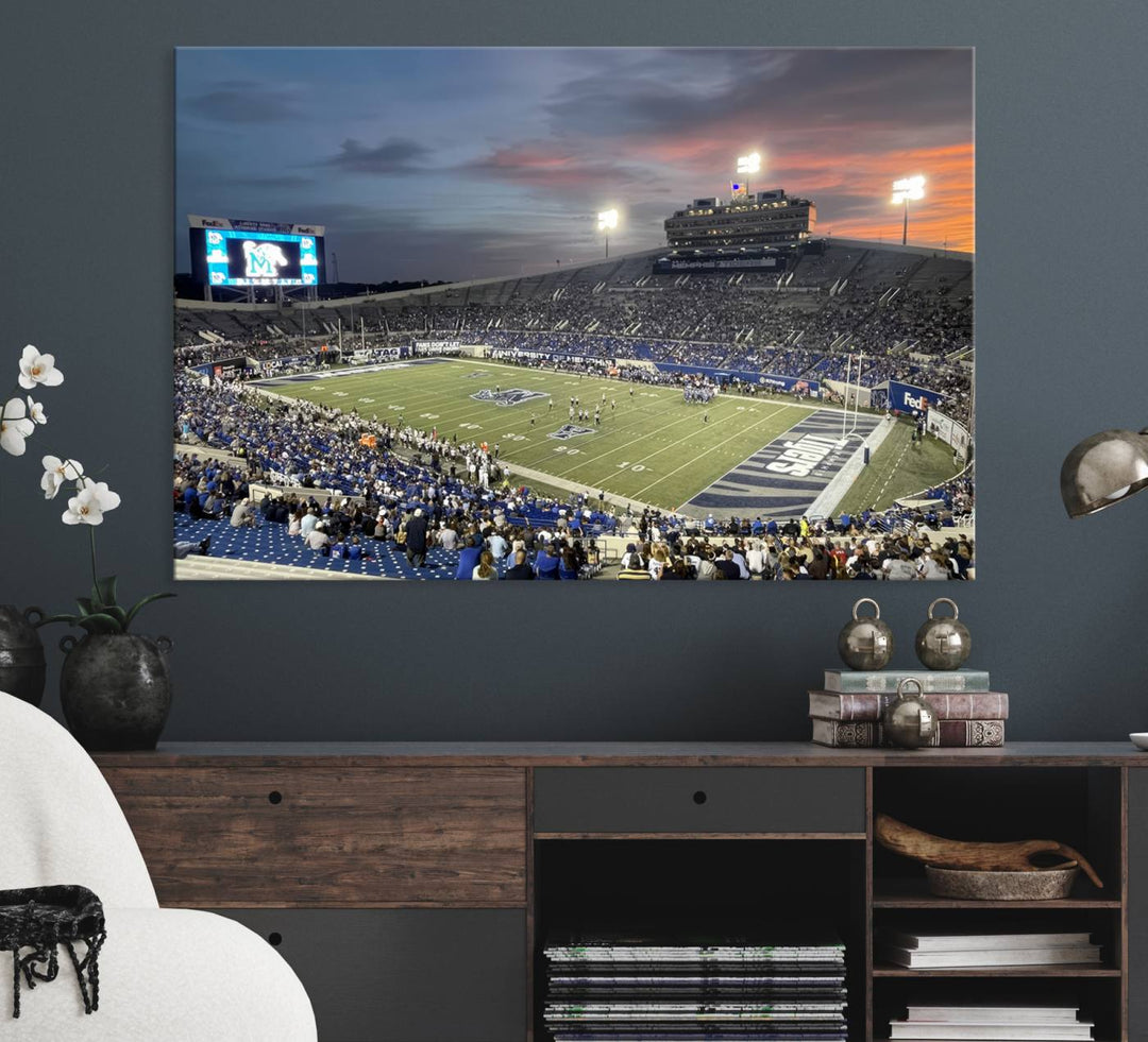 A Memphis Tigers football canvas print of Simmons Bank Liberty Stadium at sunset enhances the living room.