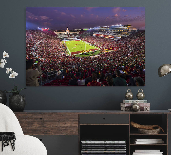 The vibrant wall art canvas print captures the USC Trojans playing under lights at dusk in LA Memorial Coliseum.