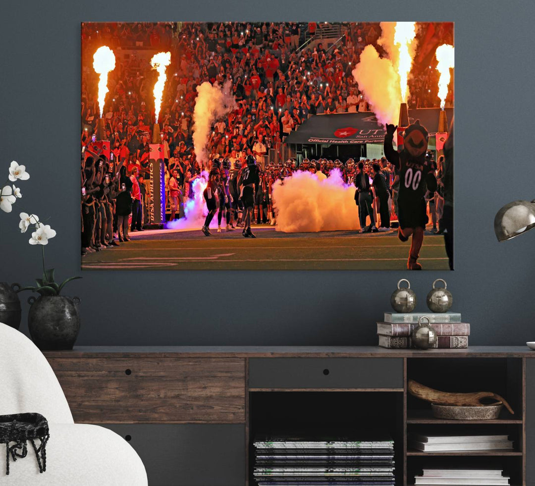 This canvas print captures the UTSA Roadrunners storming the Alamodome under smoke and fire.