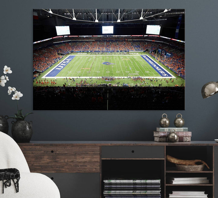 The UTSA Roadrunners game at Alamodome canvas print captures the scene from above, displaying fans and the UTSA lettering on the field.