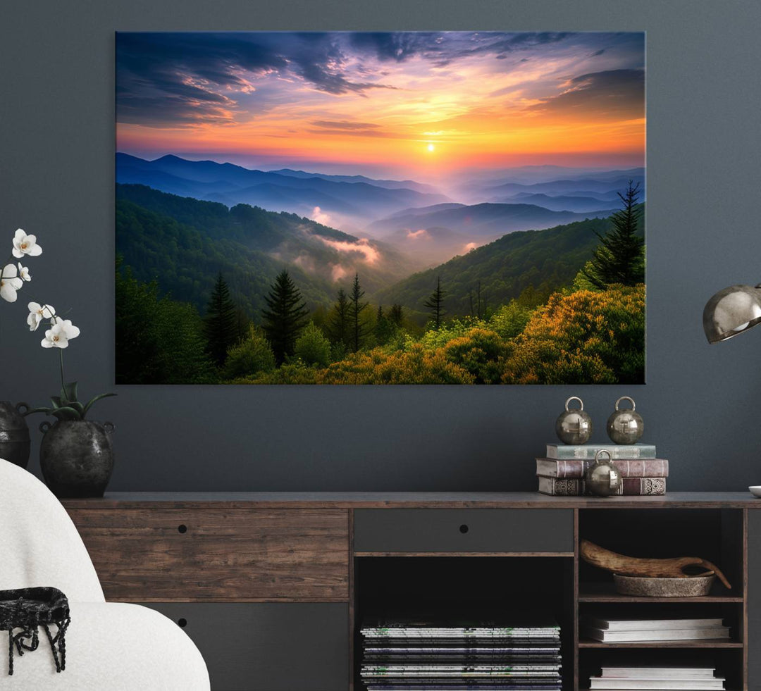 The Majestic Mountain Sunrise Print features a vibrant sky, layered hills, and evergreens, making it a stunning piece of wall decor.