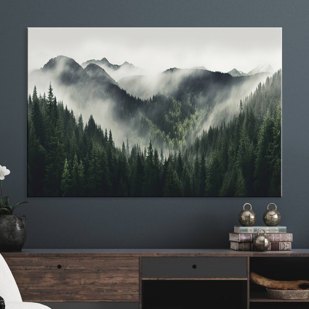 The Misty Forest Canvas Print Wall Art captures a serene misty forest scene with fog and mountains.