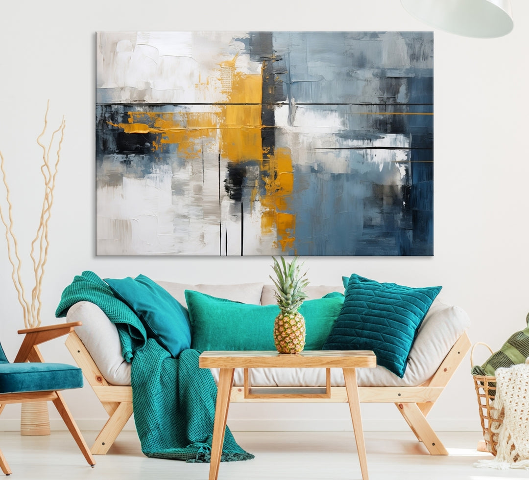 The Orange Abstract Wall Art Print features a series of white, blue, black, and yellow blocks arranged in a triptych format on museum-quality canvases. Proudly made in the USA and offered with free shipping.