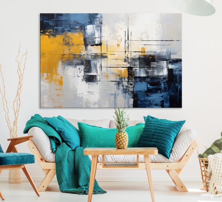 The Yellow Orange Blue Abstract Wall Art Print on gallery-wrapped, museum-quality canvases adds a vibrant touch to the room.