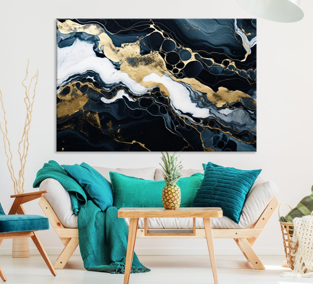 Fluid Marble Abstract Wall Art Print, a contemporary piece with black, white, and gold swirls on museum-quality canvas.