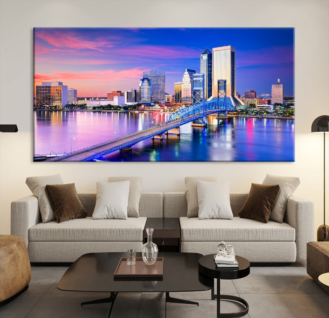 The Jacksonville Wall Art Canvas Print, showcasing the Jacksonville cityscape over a river at sunset, is elegantly crafted on museum-quality canvas with a UV-protective coating. Ready to hang, it elevates your space with its sophisticated charm.