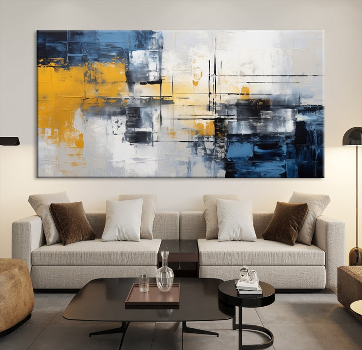 The Yellow Orange Blue Abstract Wall Art Print on gallery-wrapped, museum-quality canvases adds a vibrant touch to the room.