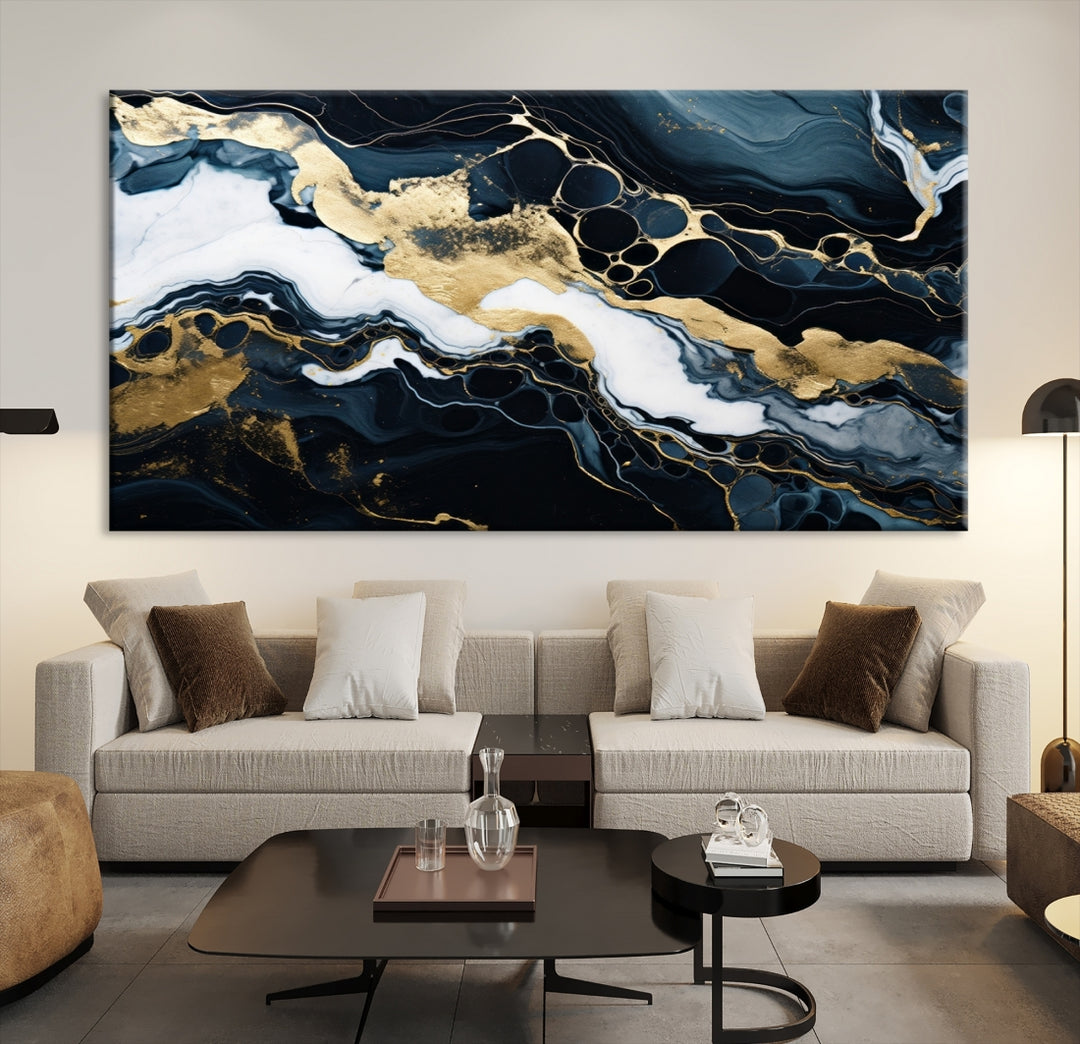 Fluid Marble Abstract Wall Art Print, a contemporary piece with black, white, and gold swirls on museum-quality canvas.