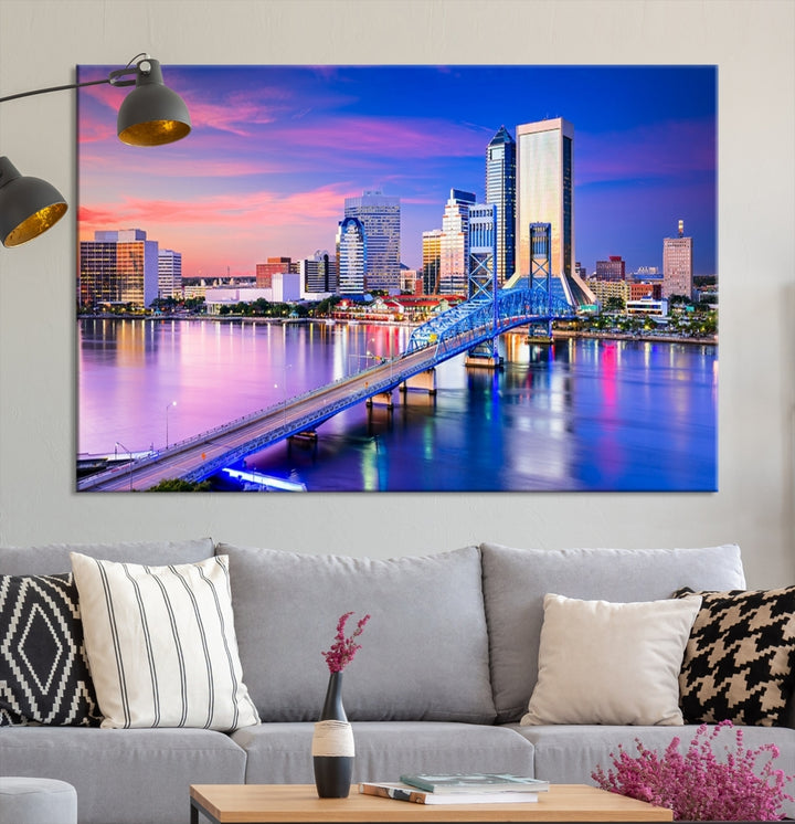 The Jacksonville Wall Art Canvas Print, showcasing the Jacksonville cityscape over a river at sunset, is elegantly crafted on museum-quality canvas with a UV-protective coating. Ready to hang, it elevates your space with its sophisticated charm.