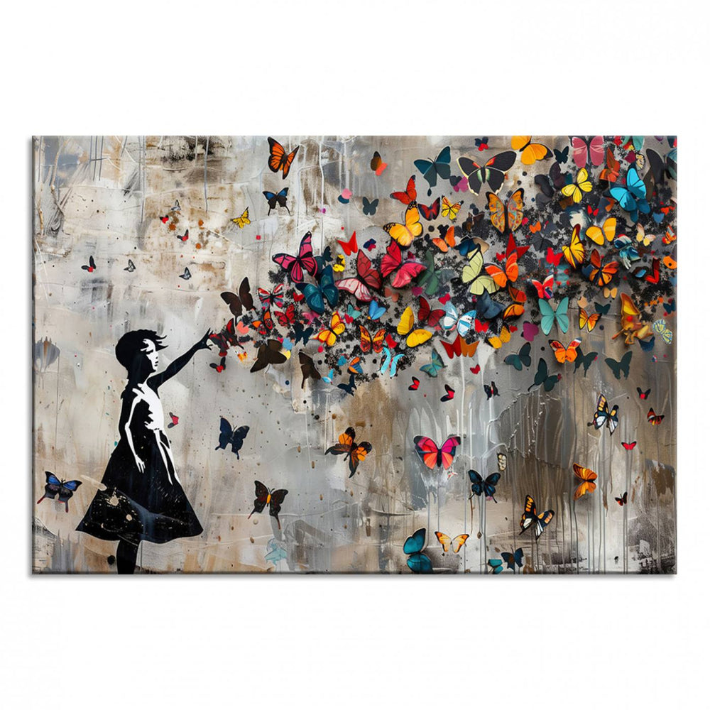 The Banksy Butterfly Girl 3-Piece Modern Graffiti Canvas Wall Art features a silhouette of a girl reaching for butterflies.