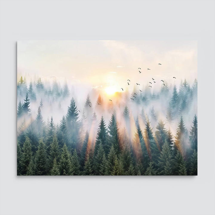 Misty Pine Forest Wall Art: A depiction of sunrise over foggy trees and birds against a bright sky; a framed woodland scene ideal for home or office decor.