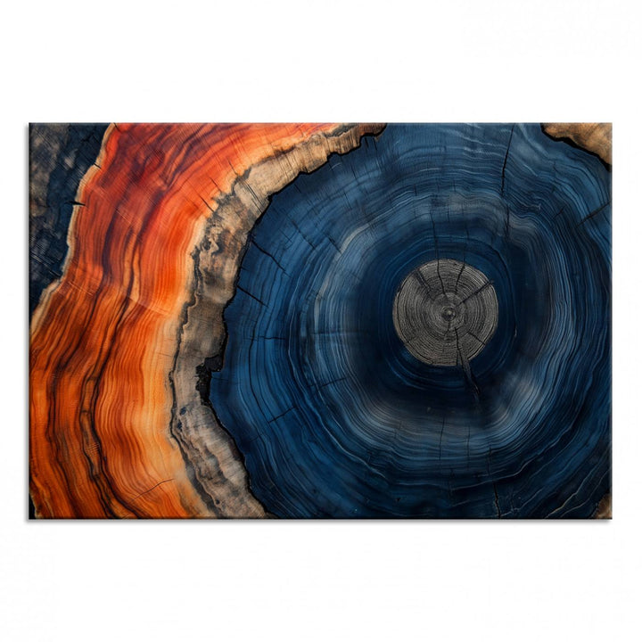 Abstract Tree Ring Wall Art Print on canvas featuring vibrant blue, orange, and brown rings with a natural rustic wood texture. Free shipping available!.