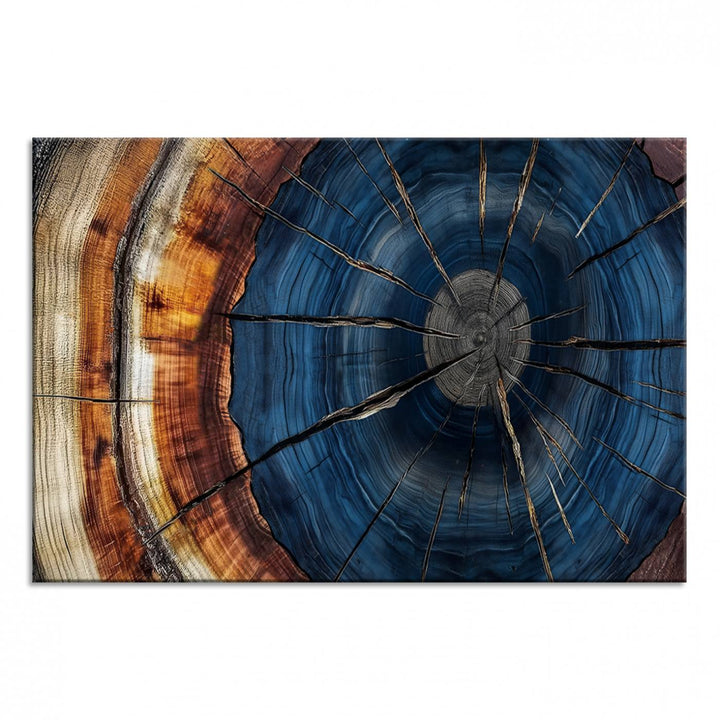 The Abstract Tree Rings Canvas Print features blue, brown, and orange rings that highlight wood grain and natures beauty.