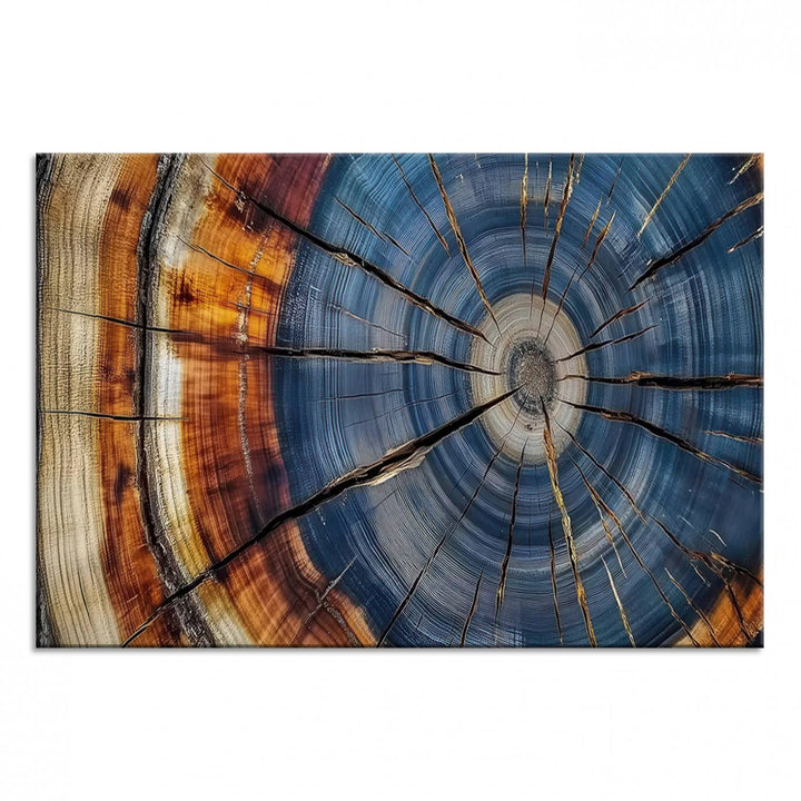 Close-up of blue, brown, and orange wood grain rings on the Abstract Tree Rings Canvas Wall Art Print.